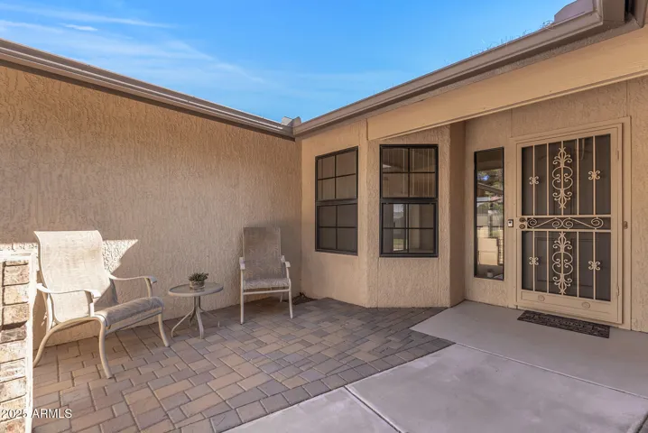 A front courtyard greets your guests, and the perfect place for a morning cup of coffee.