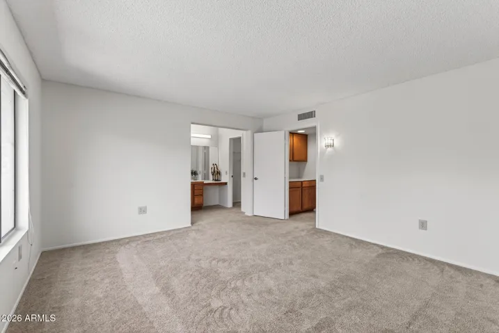 The large owner's suite offers plenty of space for a large bed.