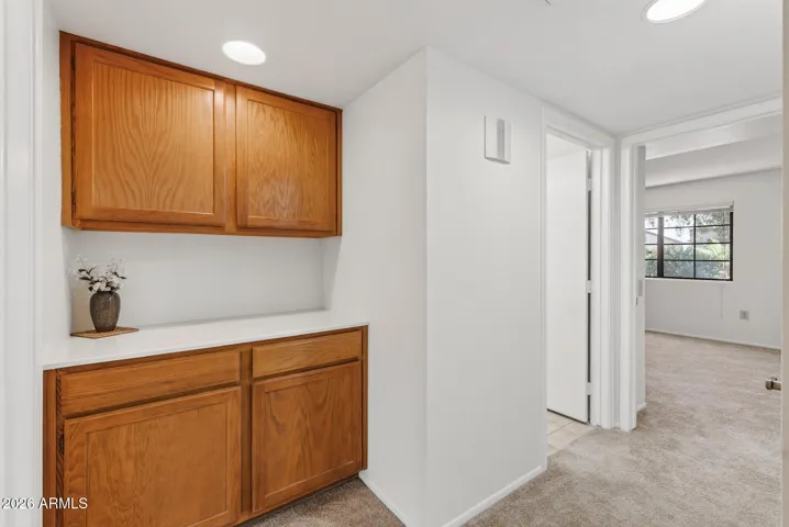 This cabinet area offers storage for all your linens & towels.