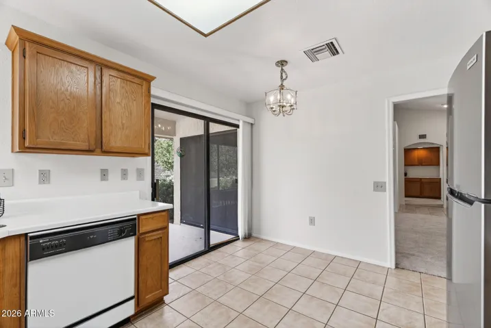 A small table fits in this space in the kitchen.