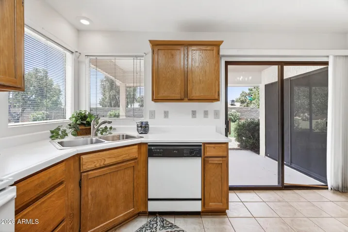 Windows and the slider make the kitchen light and bright.