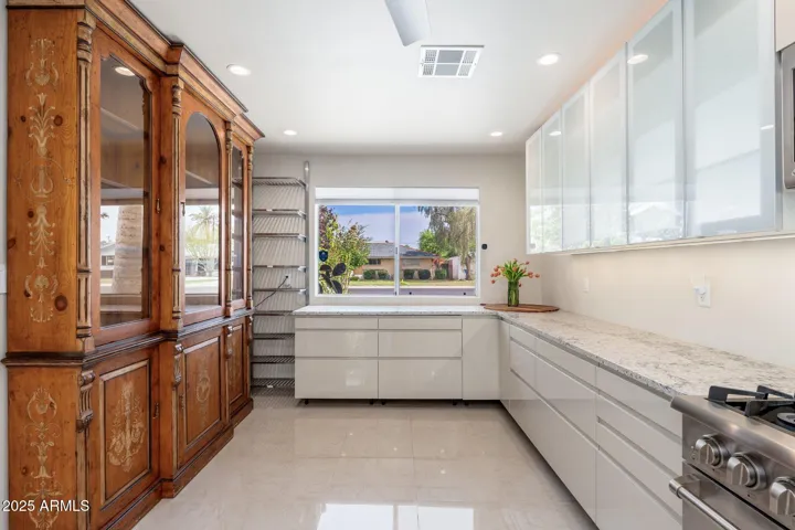 Custom lighting in cabinets, above cabinets, below cabinets and overhead.