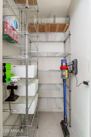 Hallway closet has electrical for those rechargeable vacuum cleaner