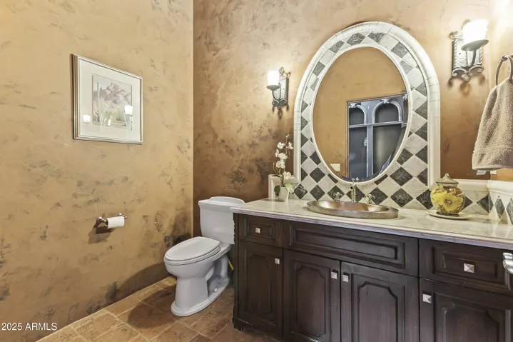 Powder room next to Laundry room