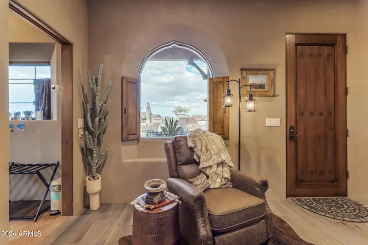 Attached casita living room. Door access to private north patio