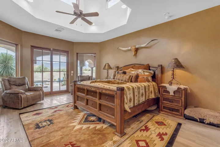 Master bedroom with elevated dome ceiling with windows