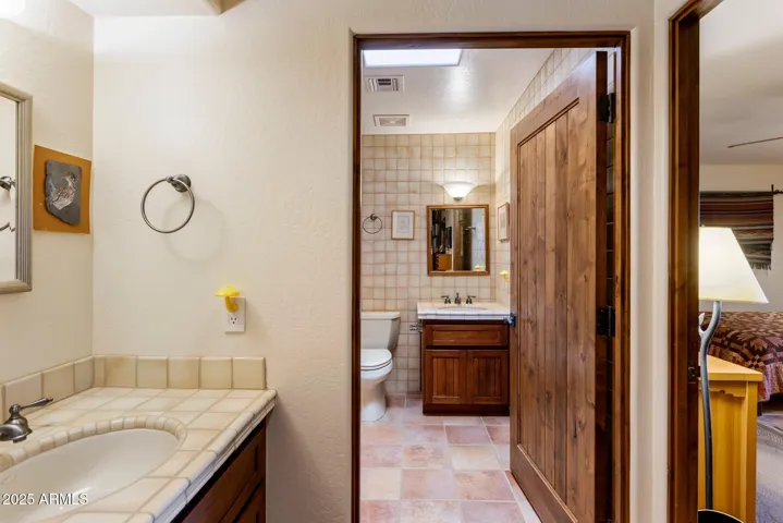 Secondary bedrooms each have their own bathroom and two vanities