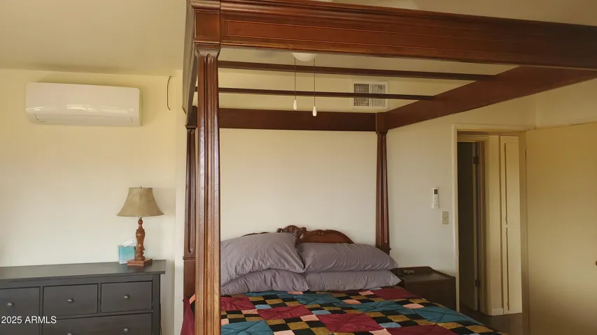 Bedroom faces south. Sliding glass door and patio make for the perfect Arizona mornings.