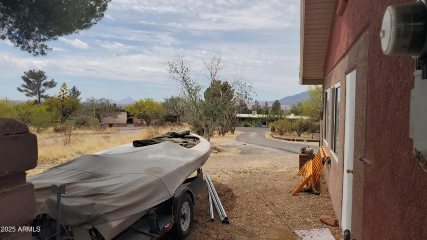 Side of home parking can accommodate boat or RV.
