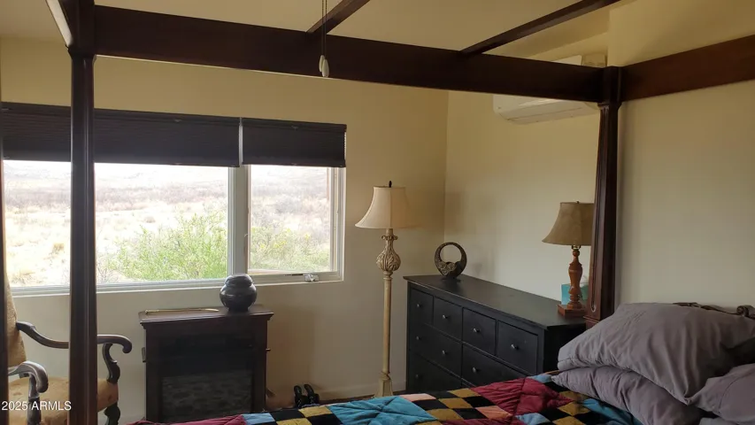 Bedroom faces south. Sliding glass door and patio make for the perfect Arizona mornings.