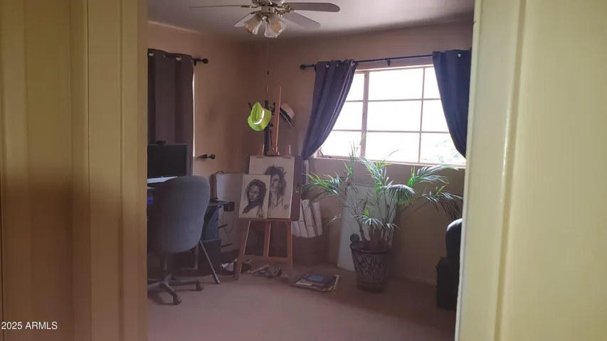 Master Bedroom with bath. Currently used as home office by single tenant.