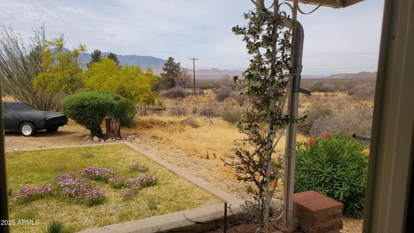 Bedroom faces south. Sliding glass door and patio make for the perfect Arizona mornings.