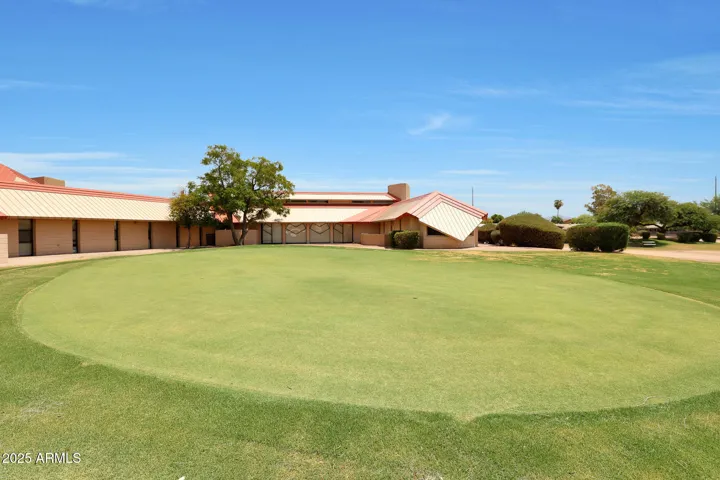 Putting green and clubhouse