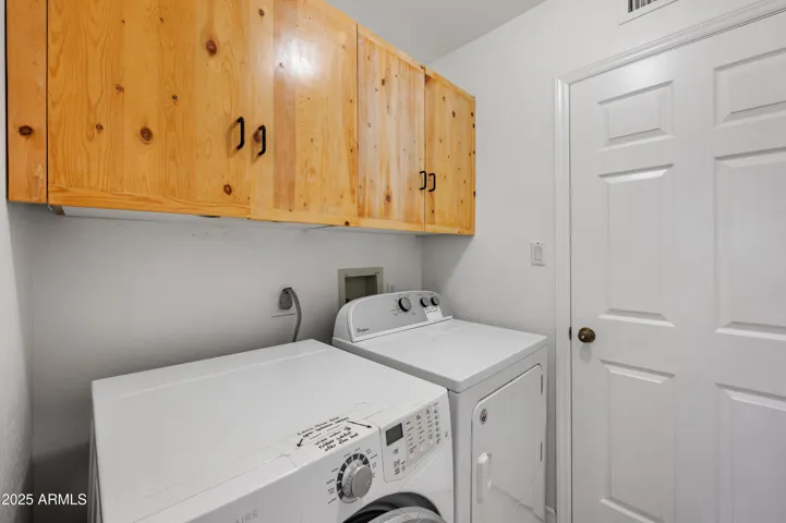 Laundry room by bedrooms!