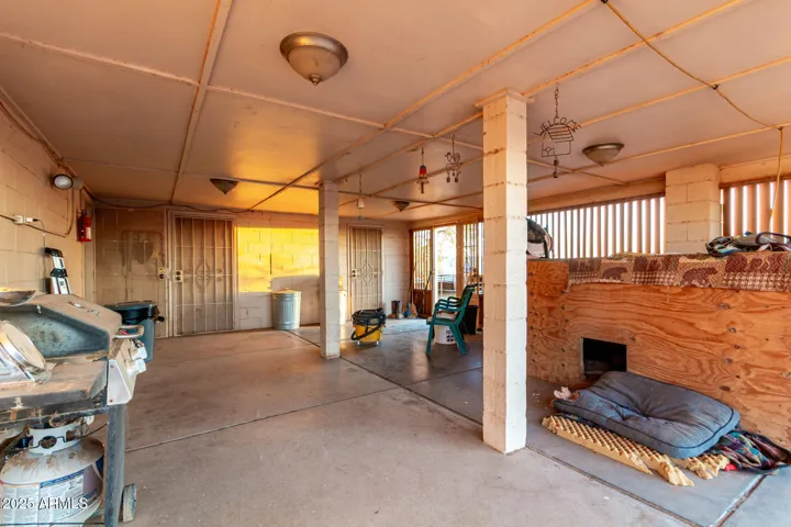 Carport - Left door - bathroom/Laundry. Right door - Tack room/Storage