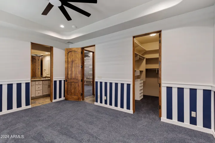 Secondary bedroom with walk in closet and jack & jill bath.