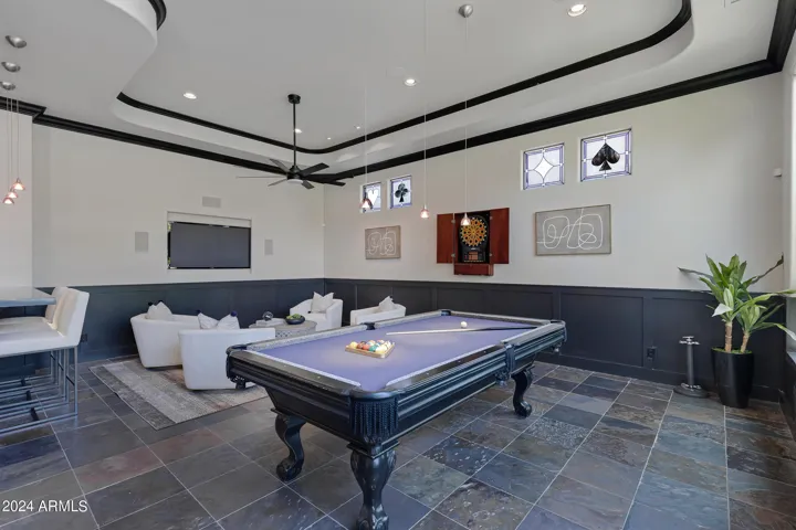 Full sized pool table conveys with the property.