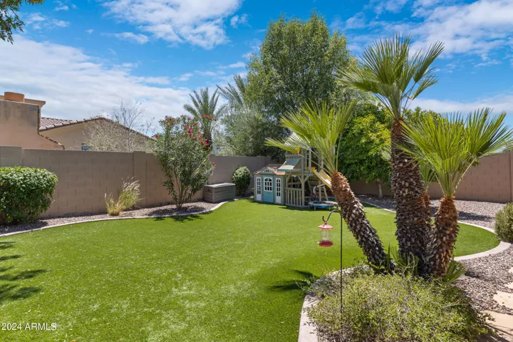 Artificial turf in the back yard play area.