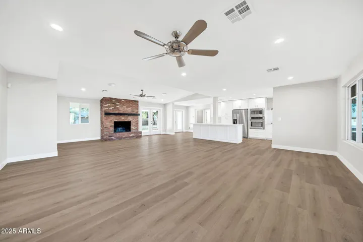 Great Room with Red Brick Fireplace
