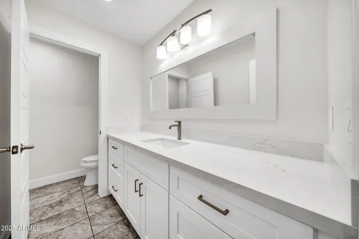 Half Bathroom - just off the kitchen to the west