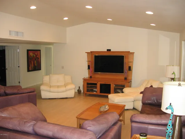 Living room with vaulted ceiling