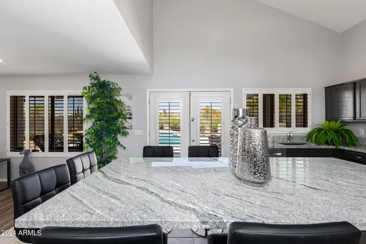 OVERSIZED ISLAND WITH 6 BAR STOOLS! HANG OUT AREA AS WELL AS A WORK AREA!
