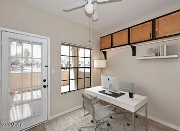 Formal dining room with added storage overlooking the covered patio!
