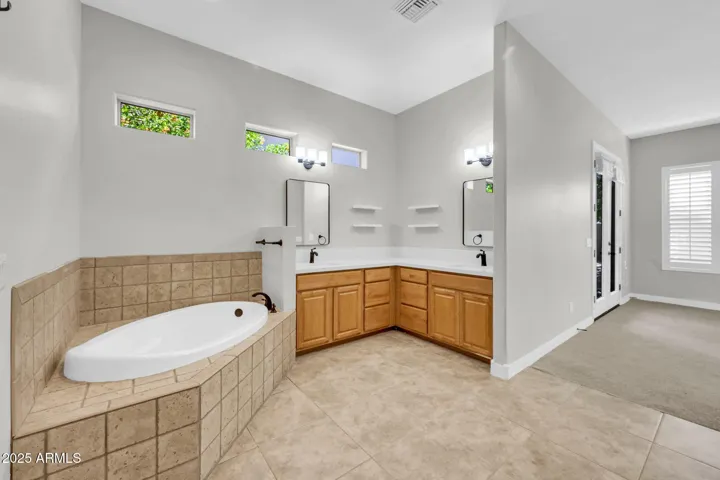 Primary bathroom with natural light