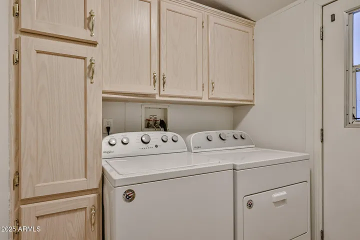 Laundry room. Washer and dryer stay