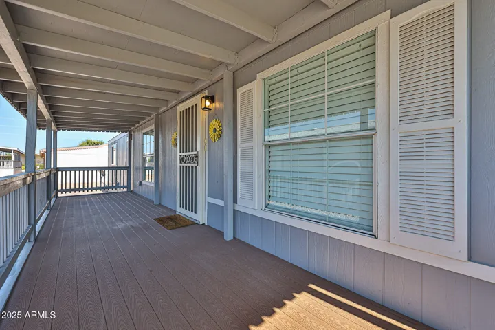 Covered Composite deck with Iron Screen door