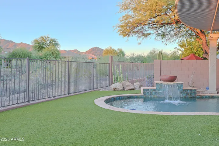 Pool and Synthetic Turf with Mountain Views