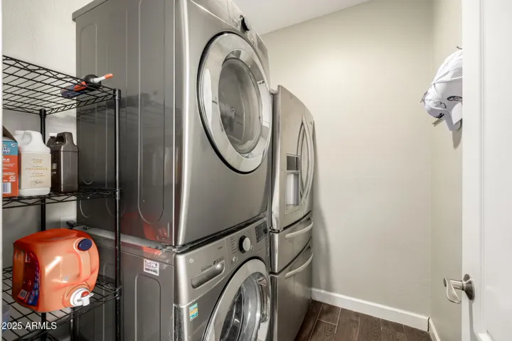 Indoor Laundry with Extra full size fridge.
