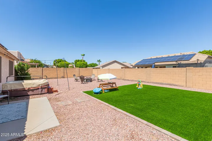 Backyard with Spa, Turf and low maintenace landscape