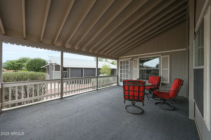 Covered porch looking out. faces East
