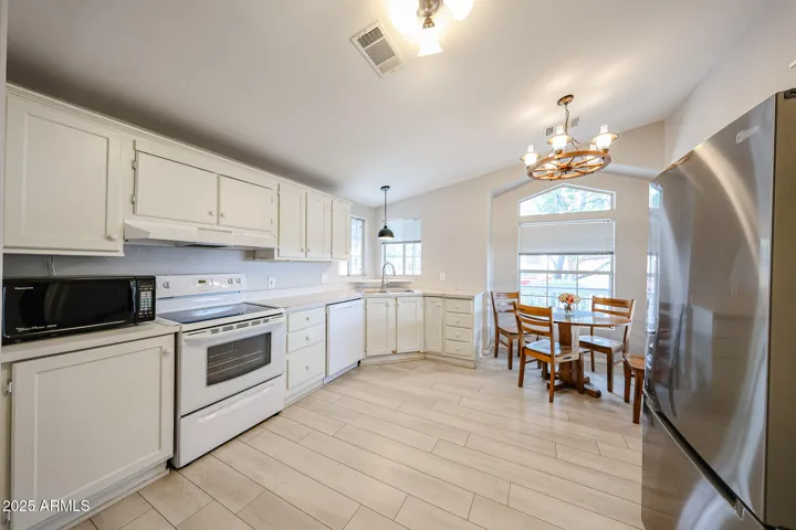 Kitchen with vinyl plank floors