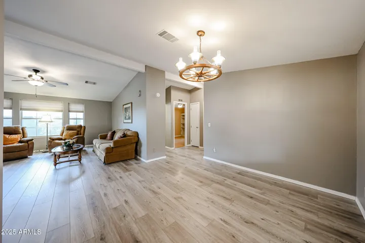 Formal dining opens to great room
