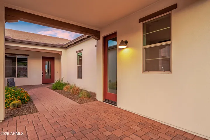 Twilight photo of the Separate entrance to the Casita, which is also connected to the house.