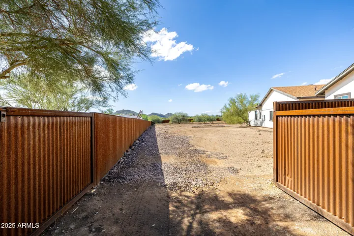 Easy access for Class A. conservative 100/80 build envelope in the distance. BUILD A MEGA WORKSHOP/GARAGE!!! This is the view from the South East Corner of the rear grounds.