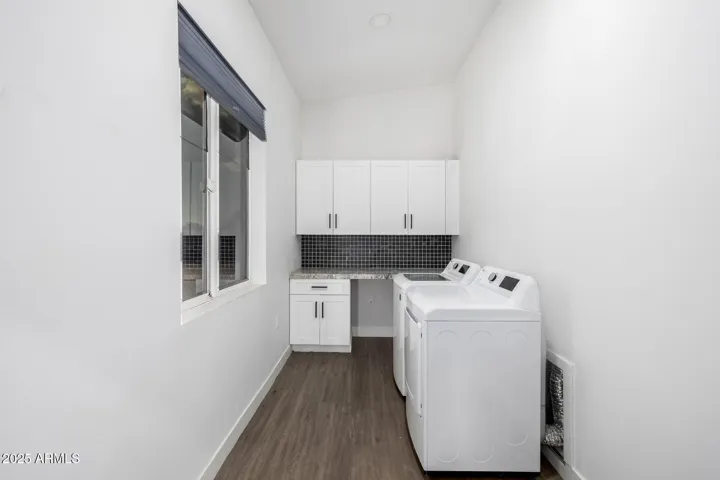 Laundry room is light and airy with ROOM to add pantry storage!