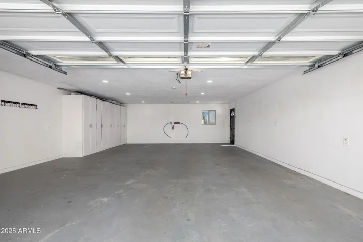 Garage is 24 feet wide and an extra 10 feet deep. Dimensions are 30 x 24