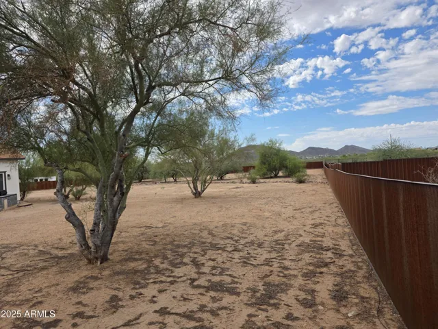 Second patio area/rear grounds. View from N/E corner of rear grounds
