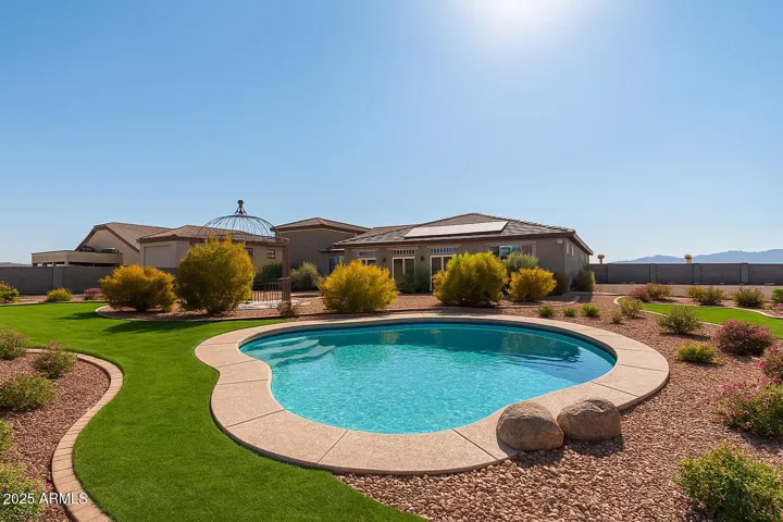Virtual rendering of backyard with pool and landscaping.
