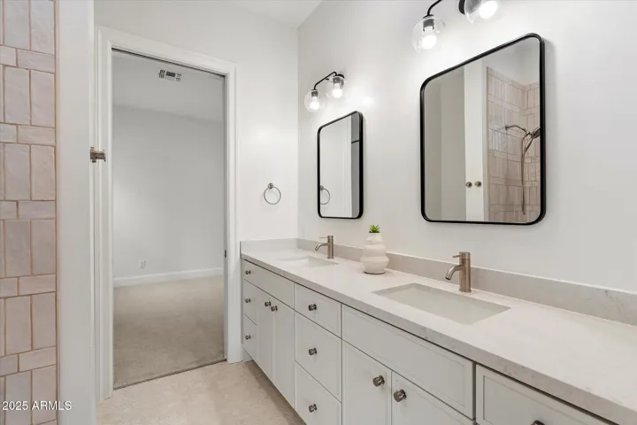DUAL VANITY SHARED WALK THROUGH BATHROOM