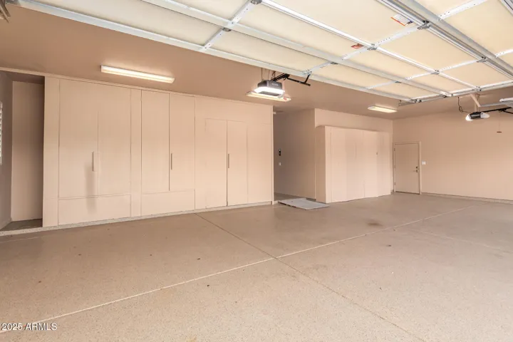 3 CAR GARAGE- LOTS OF STORAGE - FREEZER