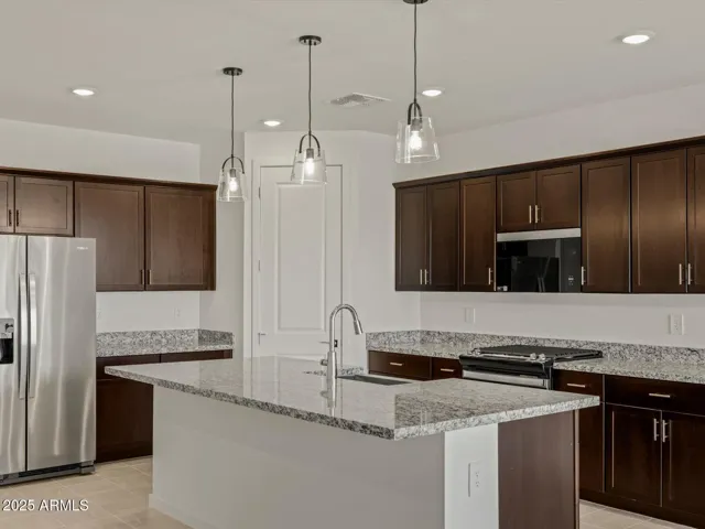 Photo is not of the actual home. Interior finishes and fixtures may vary.