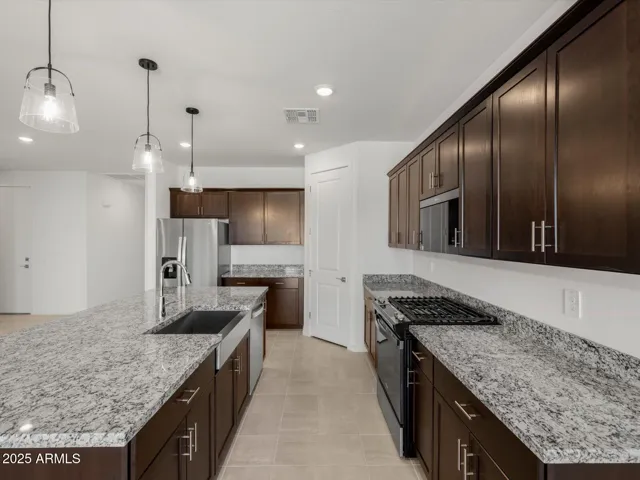 Photo is not of the actual home. Interior finishes and fixtures may vary.