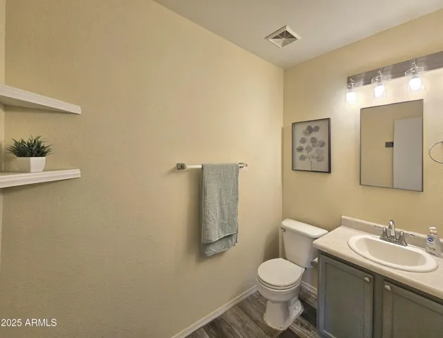 Main-level powder room perfect for guests.