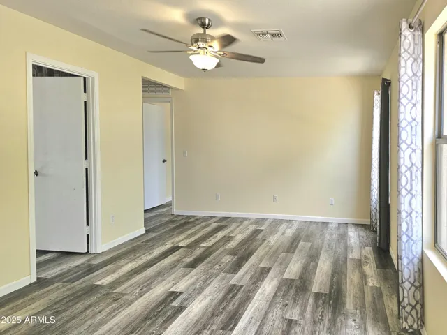 Versatile loft space perfect for media, office, or play area.