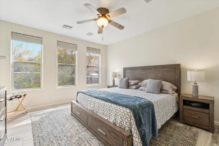 Larger of 2 Primary Bedrooms on the Main Floor. Located off the kitchen and dining.