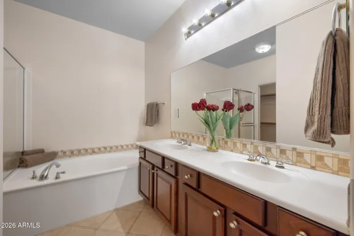 Full master bath with jetted tub, shower & dual sinks